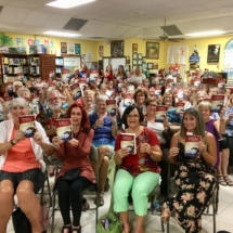 Copperfish audience holding books